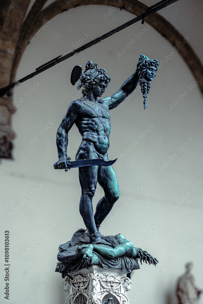 Florence, Italy - June 20, 2024: Perseus with the Head of Medusa is a bronze sculpture made by Benvenuto Cellini in the period 1545–1554