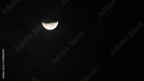 Moon and clouds at night, dark sky background