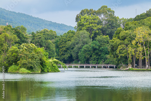 a public place leisure travel landscape lake views at Ang Kaew Chiang Mai University and Doi Suthep nature forest Mountain views spring cloudy sky background with white cloud. photo