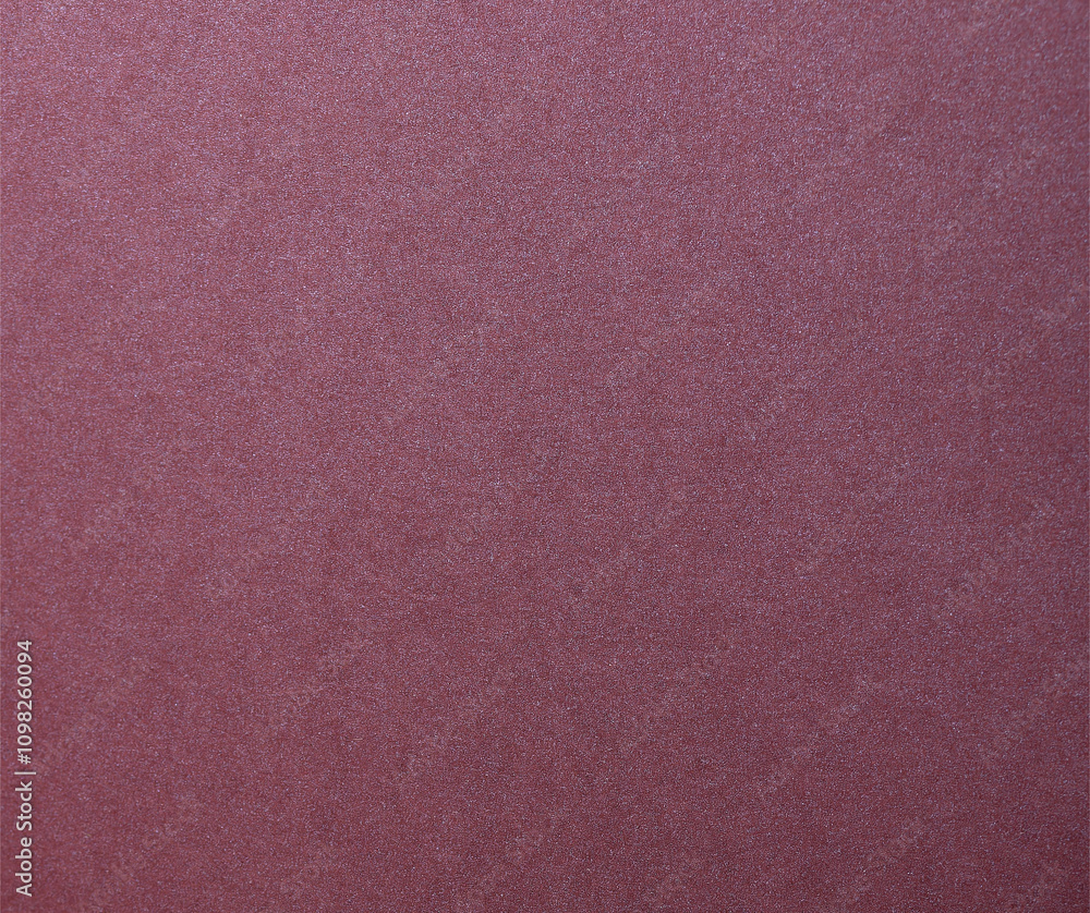 Fototapeta premium Metallic burgundy paper background with a smooth, shimmering surface and sleek, glossy sheen. Featuring rich, deep tones and a subtle gradient, it exudes elegance and