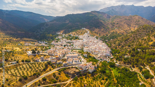 Aerial drone photo of the white village of Tolox in Spain photo