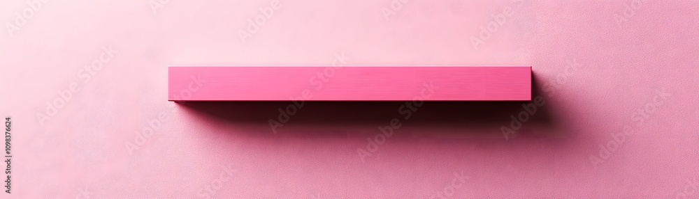 Obraz premium Pink rectangular block on a pink textured background