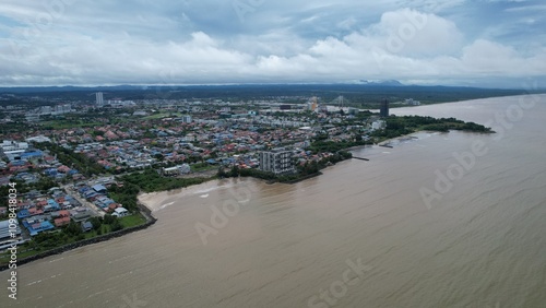 Bintulu, Malaysia - November 23, 2024: The Tanjung Batu Beach of Bintulu photo