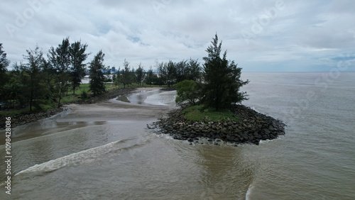 Bintulu, Malaysia - November 23, 2024: The Tanjung Batu Beach of Bintulu photo