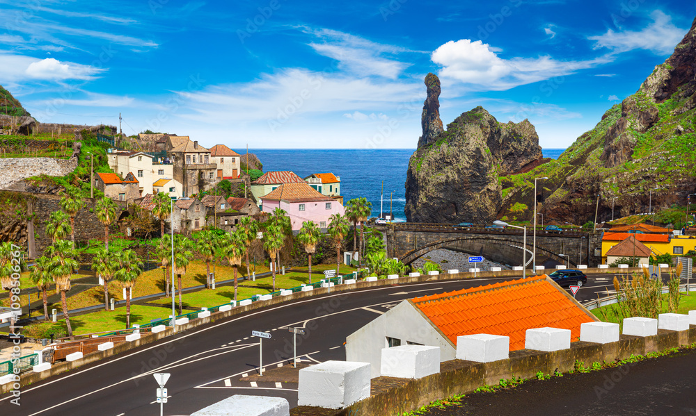 Tall lava rocks in ocean, islet towers in Ribeira da Janela, Madeira Island, Portugal
