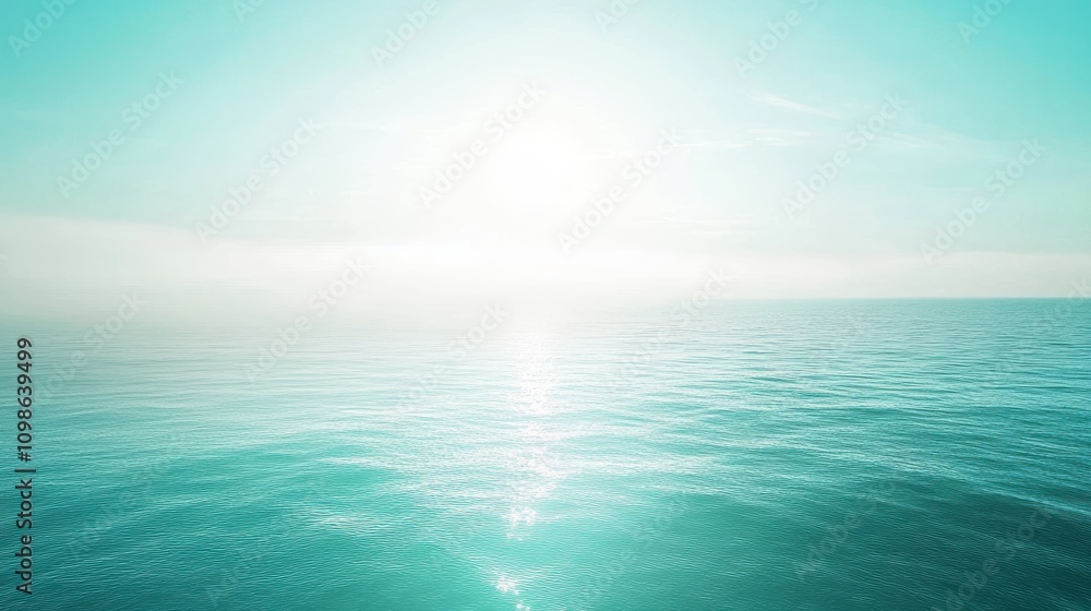Naklejka premium A calm blue ocean with a sun shining on the water