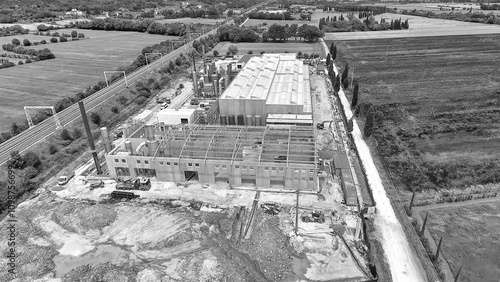 Early Construction Phase with Workers and Equipment on Site photo