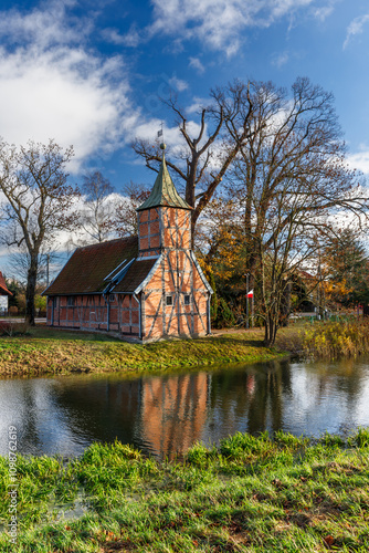 Foto View of the old church in Wróblewo near Motława river