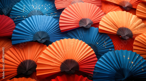 Many colorful paper fans forming a vibrant and lively background with an asian feel photo