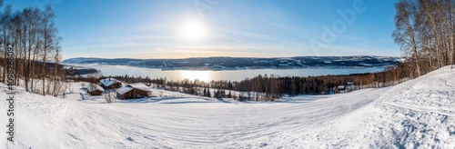 In winter, Hjrundfjord and Norangsfjord are surrounded by mountains and fjords photo