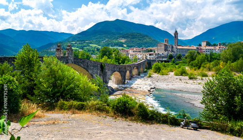 Old bridge Ponte Vecchio, also known as Ponte Gobbo or  Devil's Bridge, at Gobbio, Emilia-Romagna, Italy photo