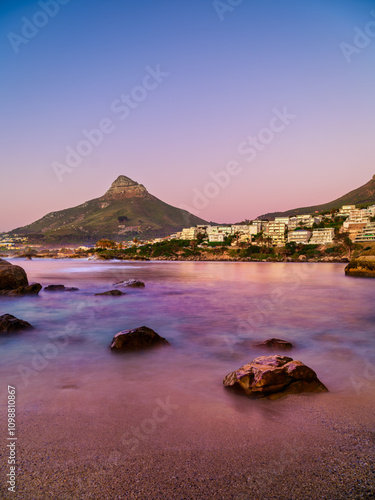 Obraz na płótnie Twilight colors at sunset in Camps Bay, vertical shot, Cape Town, South Africa w salonie