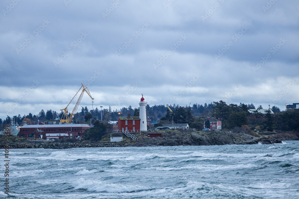 Fototapeta premium Scenic View of Lighthouse and Harbor in Victoria, BC, Canada