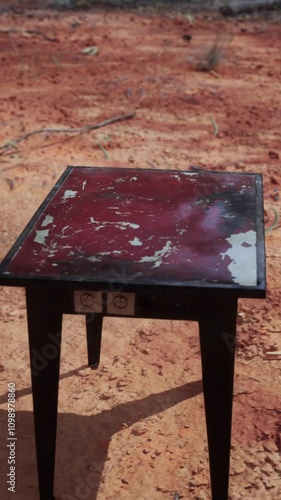 old ruster metal table in desert photo