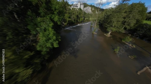 Drone footage of the Walzin Castle overlooking river Lesse in the city of Dinant, Wallonia, Belgium photo