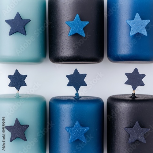 Candle Lighting for Hanukkah with decorative blue stars of David. photo