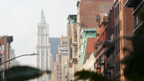 New York City Manhattan Soho fashion district, Broadway street. USA urban old classic american architecture. Shopping in NYC, United States. Business and residential real estate. Woolworth building.