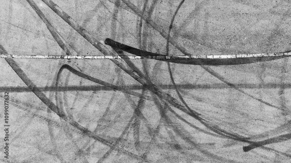 Car tire mark from car skid mark, Car tire on asphalt road race track, Texture and background car wheel tire mark on asphalt road.