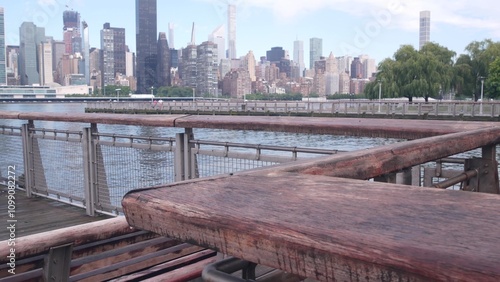 New York City waterfront skyline, Manhattan Midtown buildings, riverfront skyscrapers by East river water. Waterside cityscape view, Gantry Plaza pier, Long Island, Queens. United States architecture. photo