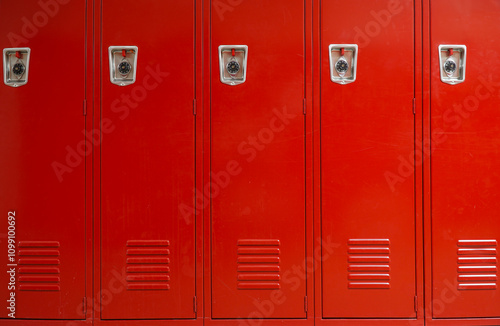 close up on red lockers in the school