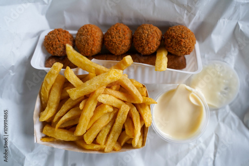 Belgian Fries with 'Bitterballen' and a 'Frikandel' photo