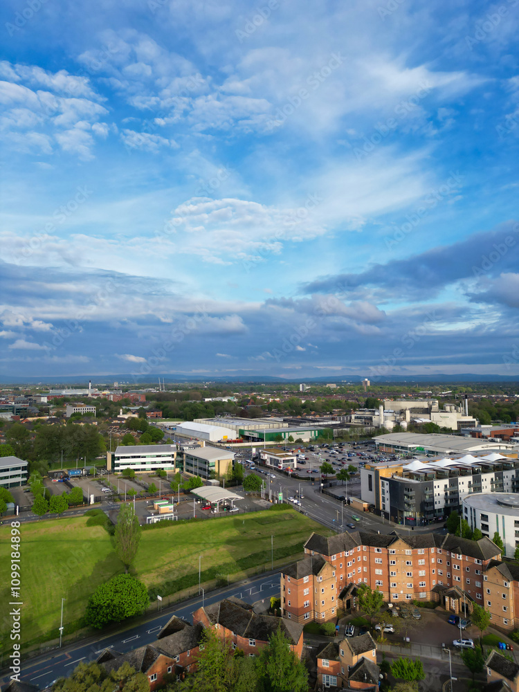 Fototapeta premium Aerial View of Buildings at Greater Manchester Central City, Northwest of England, United Kingdom. Aerial View Footage Was Captured with Drone's Camera on May 4th, 2024 During Sunset Time.