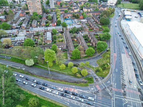 Aerial View of Buildings at Greater Manchester Central City, Northwest of England, United Kingdom. Aerial View Footage Was Captured with Drone's Camera on May 4th, 2024 During Sunset Time. photo