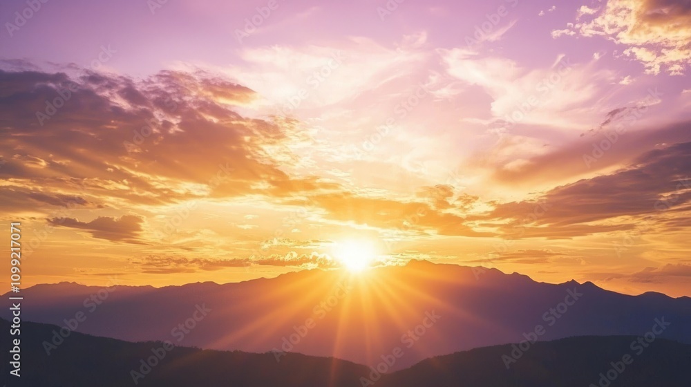 Obraz premium Majestic Sunset Skyscape with Silhouetted Mountains - Tranquil and Breathtaking Scene of Vibrant Colors and Golden Reflections
