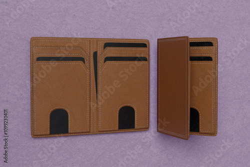 Blank leather wallet brown fold mock up, isolated, 3d rendering. Empty fabric clutch mock up front view V6 photo