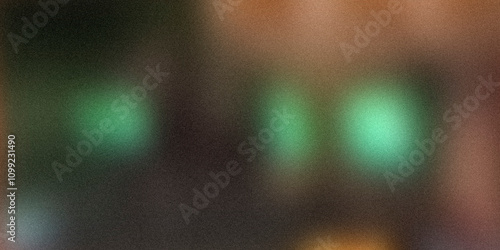 Green bluer highlights on a dark background, blurred abstract texture with grainy noise, rough texture