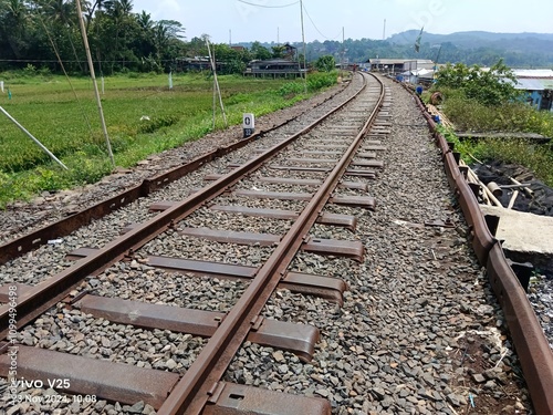 The colonial railway line from the Dutch colonial era is still sturdy and is still used today at Rawa Pening Lake, Ambarawa, Asia, Indonesia photo