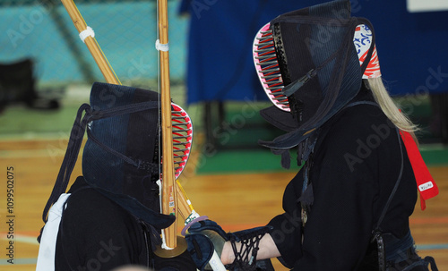 Sports, Kendo. Athletes with a sword and Men on his head. High quality photo