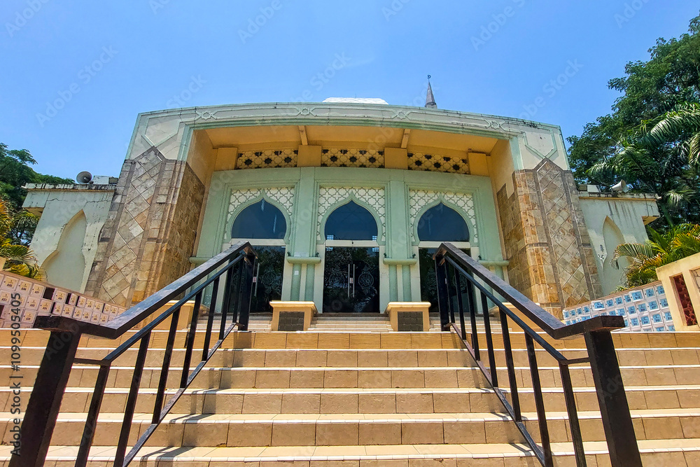 Fototapeta premium Ceramic stairs of a modern mosque against a blue sky