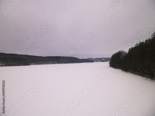 Frozen Ostrzyckie lake in Wiezyca. photo