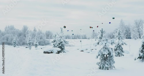 Magic winter view with lot snow on the ground. 3D animated gifts flying around