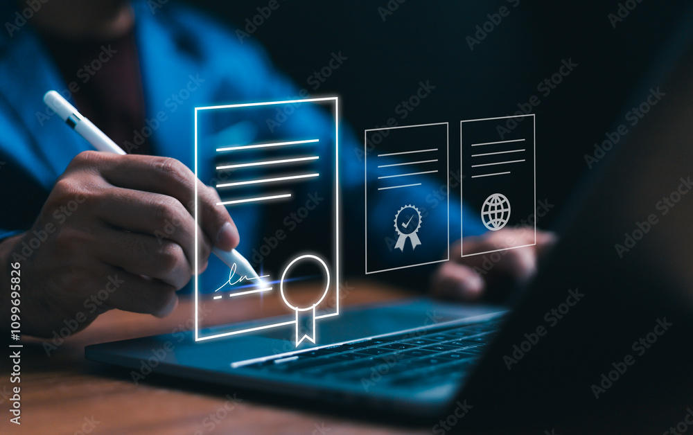 Concept of digital contract innovation. A person uses a stylus to sign a digital document displayed as a glowing hologram above a laptop, symbolizing e-signature and secure online certification.