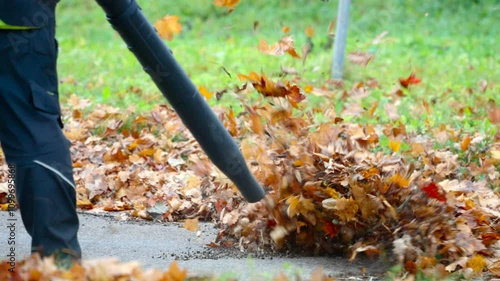 Blowing leaves with a special device, slow motion