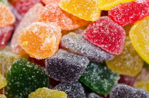 Sugar coated jelly pieces background photo