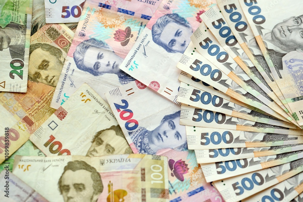 Obraz premium Big amount of different ukrainian hryvnia currency money bills in pile