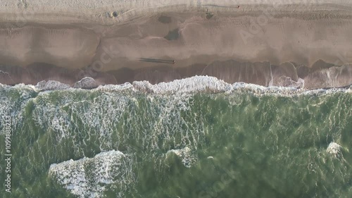 waves flowing onto the beach