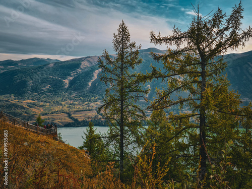 kanasi lake landscape or mountain view, scenery of mountain in China, travel destination or tour tourism, xinjiang, majestic panorama nature view. destination, blue sky, hill top, calmness. photo