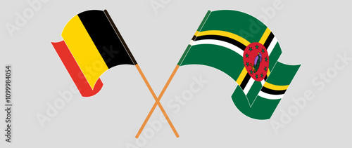 Crossed and waving flags of Belgium and Dominica. Vector illustration photo