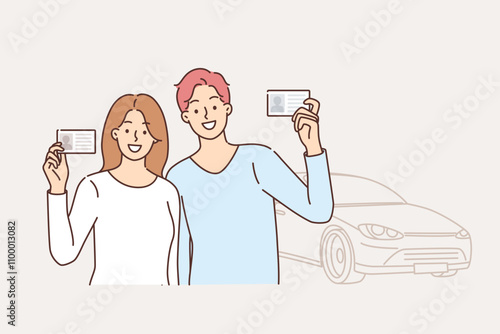 Driving school graduated men and women who received driver license and right to drive car