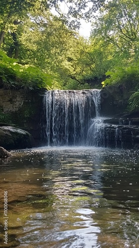 Stunning Waterfall in Lush Forest Landscape photo