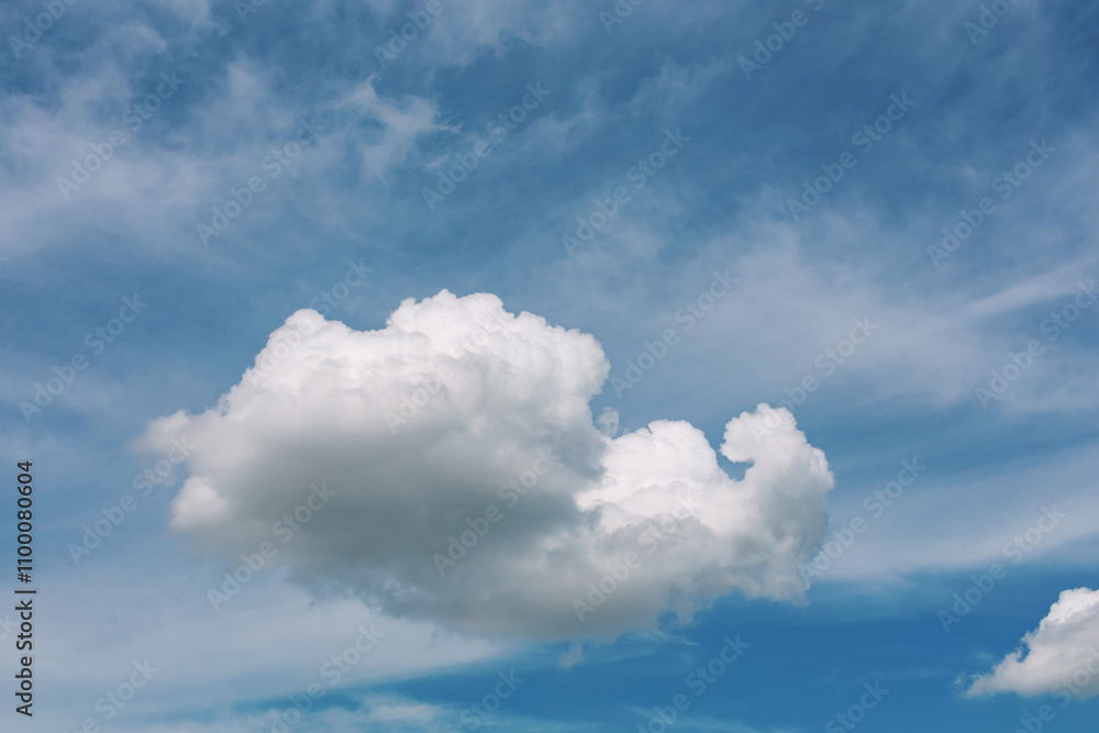 White clouds during a beautiful clear sky time White clouds during a beautiful clear sky time
