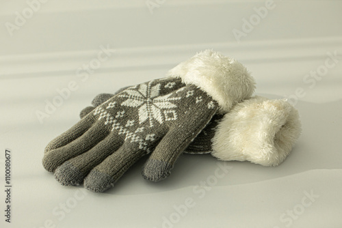 Pair of grey knitted gloves