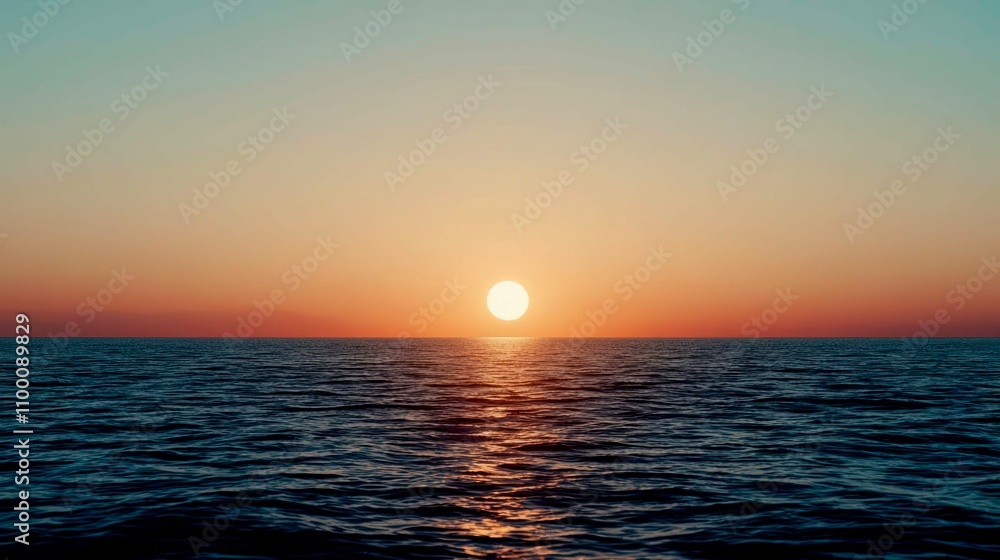 Obraz premium The sun is setting over the ocean