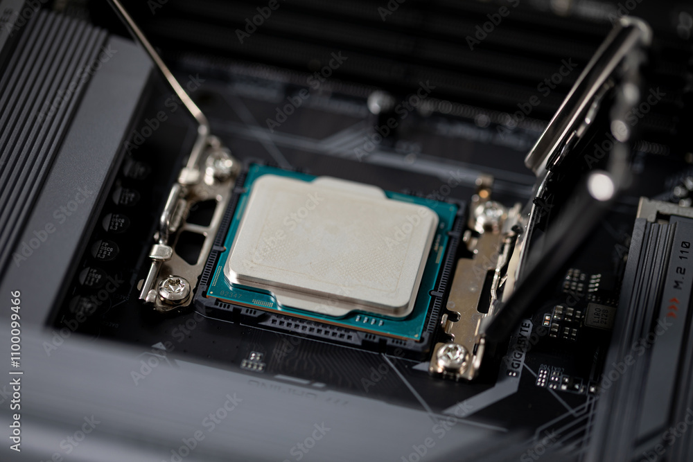 Fototapeta premium Closeup of a CPU expertly installed on a motherboard, showcasing its intricate design