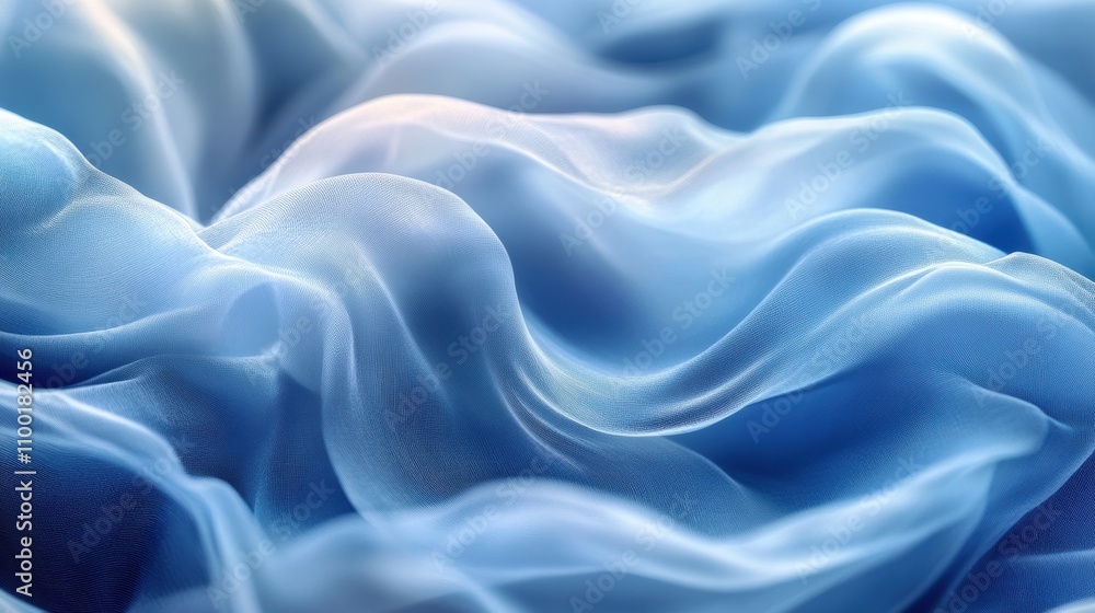 Obraz premium A mesmerizing close-up photograph captures the delicate, soft, and wavy patterns of a translucent blue fabric that appears both elegant and ethereal