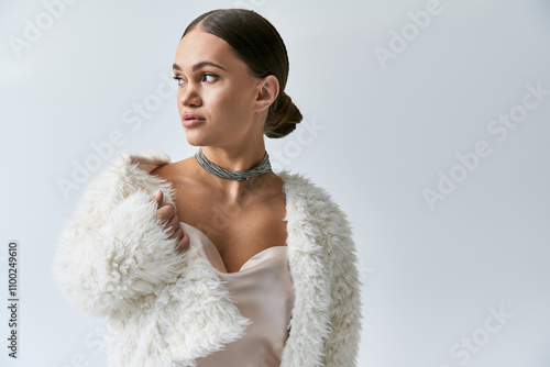 Slika na platnu Fashionable young woman with achondroplasia showcases her exquisite style with a faux fur jacket